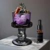 Base morada y gris + flor seca + cristal