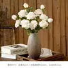 4 white flowers (vase not included)