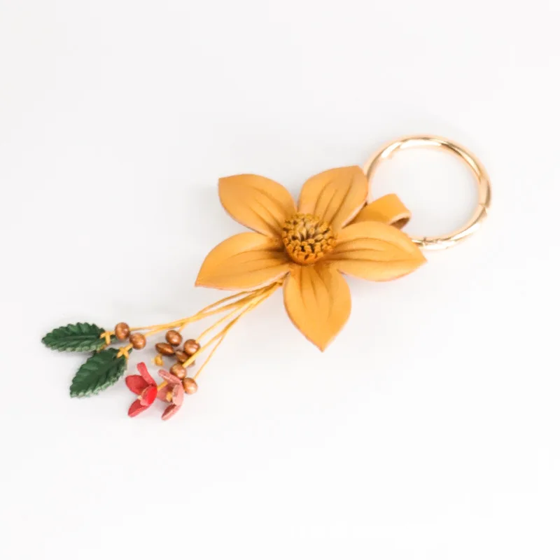 MEAKTSMI Elegante ciondolo a forma di fiore in pelle squisito portachiavi in pelle con ciondolo a forma di fiore per accessori unici, a