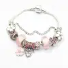 Fiore con fiocco rosa pieno di diamanti