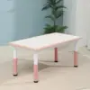 Whiteboard with pink begonia leaf table