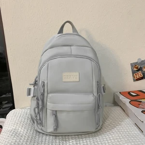 Omaska Wholesale Fashion Waterproof Geometric Zipper Teenager Bas17 Inch Students Backpack Women Nylon School Bag