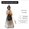 Medium-sized brownish-yellow witch