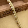 Cinta de perlas blanca y dorada de 6 mm