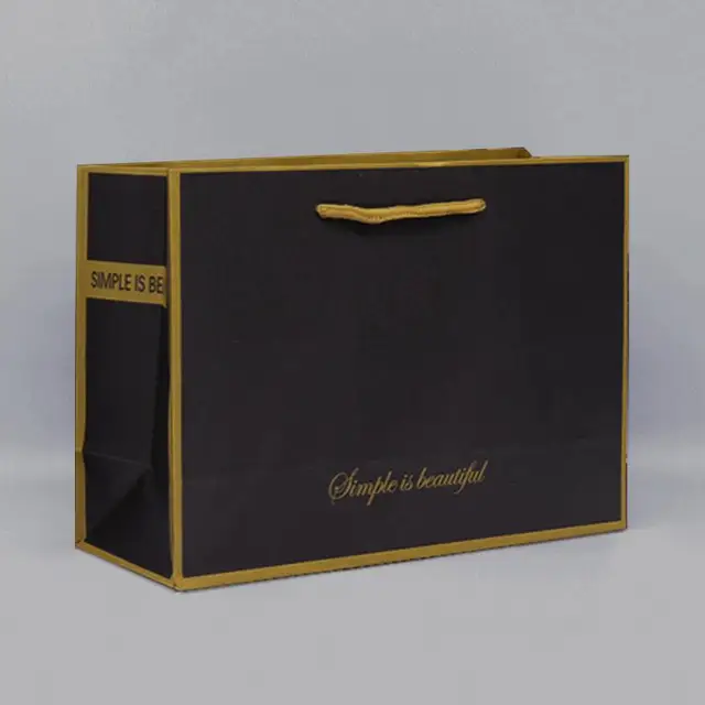 High Quality Thickened Kraft Paper Clothing Bag Black Kraft Paper Shopping Bag Sturdy And Durable With Customizable Logo