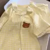 Piccolo orso bruno giallo