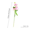The lotus flower has seven heads and is light pink in color.