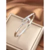 Silver rhinestone nail