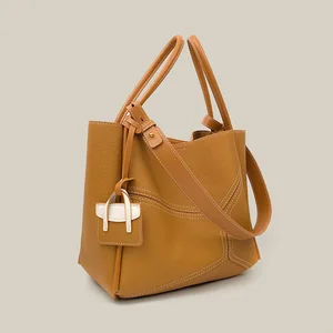 A-147 2026 New Women's Genuine Leather Tote Bag Niche Design Splicing Shoulder Crossbody Bags Polyester Lining Zipper Fashion