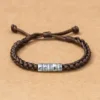Pink bracelet with black buckle