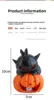 Cat lying on pumpkin