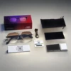 Gold framed brown lens