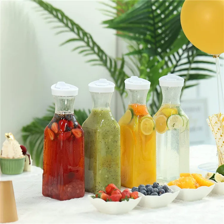 Plastic Juice Carafe with Lids (Set of 4) 50 oz Carafes for Mimosa