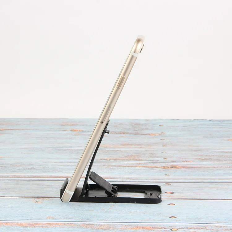 Foldable universal adjustable mobile phone holder