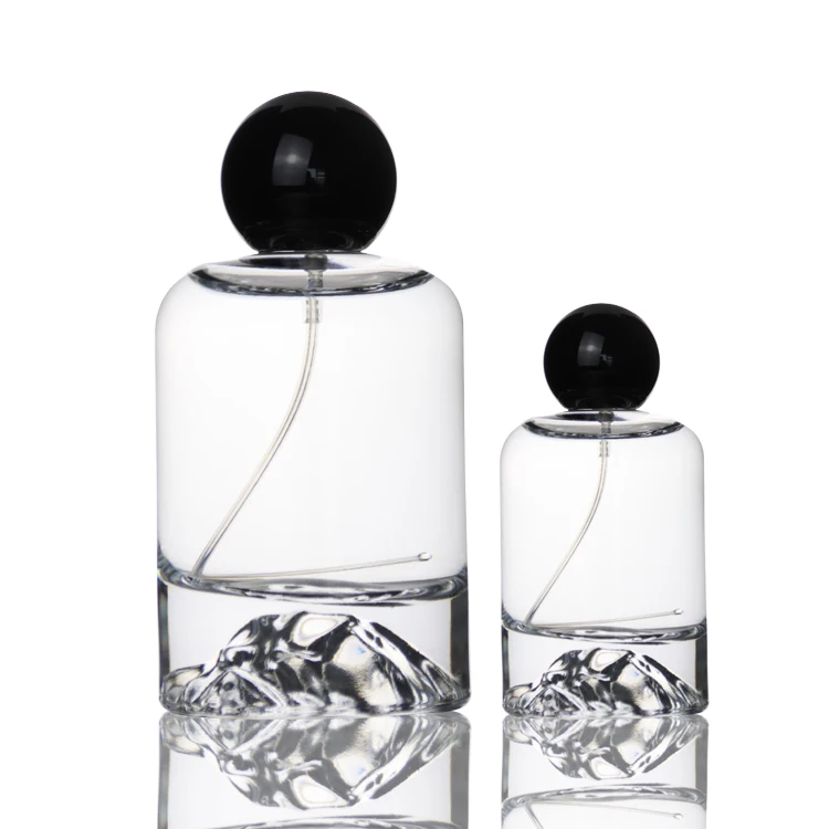 Leere 50 ml 100 ml hochwertige runde transparente OEM ODM Glasparfümflasche mit Pumpe Zerstäuberdeckel