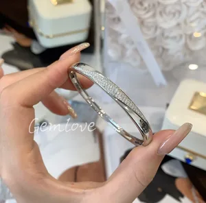 Luxurious  innovative 18K gold armreifen designed exclusively for women featuring IGI certified lab-grown round diamonds