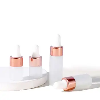 High-end Custom Frosted Cylindrical Glass Tube-pulled Bottle with White Rubber-tipped Dropper and Rose Gold Ring Collar