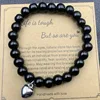 Bright black belt card with heart 01