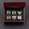 6 anillos + caja de madera de 6 agujeros