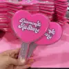 coeur rose vif avec diamant