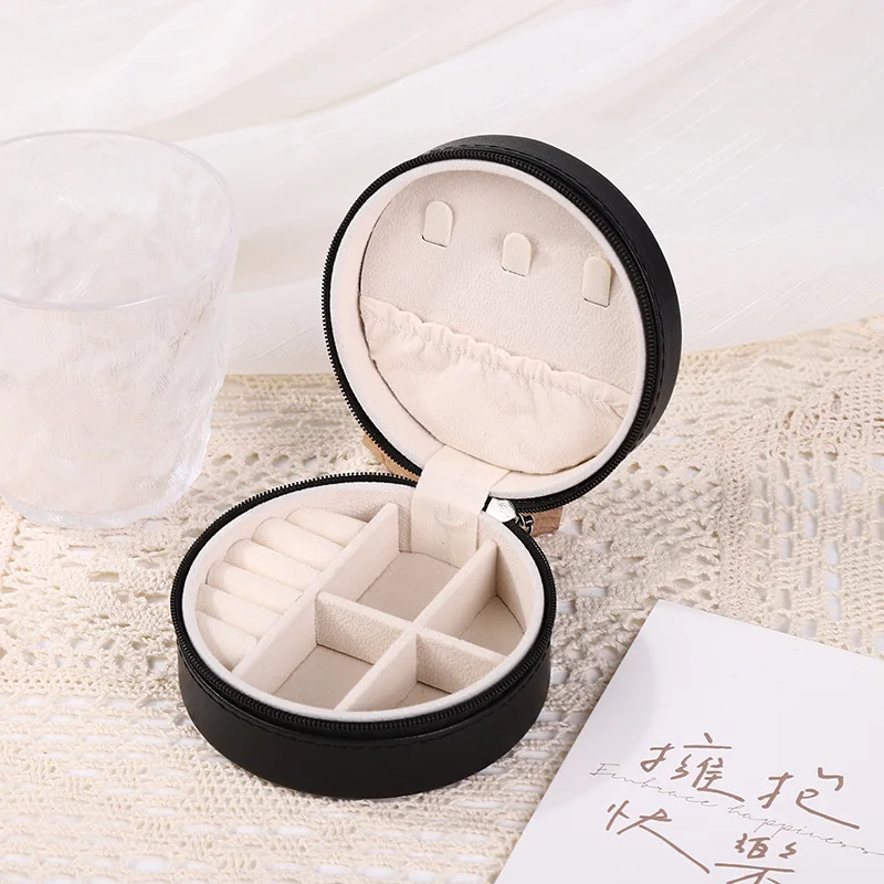 New round zipper jewelry box cross-border pu necklace earrings ring multifunctional storage box portable jewelry box manufacture