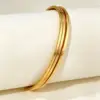 Oro 65mm, tre anelli - 004