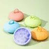 Small hat-shaped hairbrush