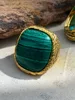 Anelli in oro con malachite