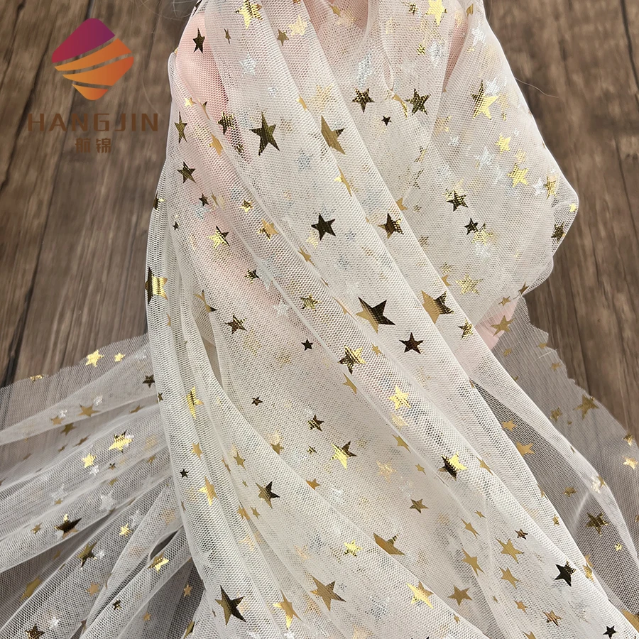 Wholesale Soft Print Gold Stars Tulle Lace Fabric Hot Foil Stamped Glitter Stars Mesh Fabric for Birthday Party Baby Tutu Dress Wholesale Soft Print Gold Stars Tulle Lace Fabric Hot Foil Stamped Glitter Stars Mesh Fabric for Birthday Party Baby Tutu Dress