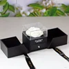 Caja doble abierta negra pequeña cabeza de flor fragante