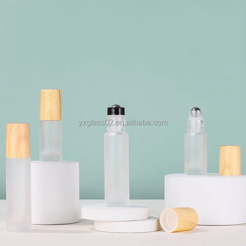 Roll On glass Bottle 5ml 10ml essential oil roller bottles skincare cosmetic packaging glass bottle with bamboo wooden cap supplier