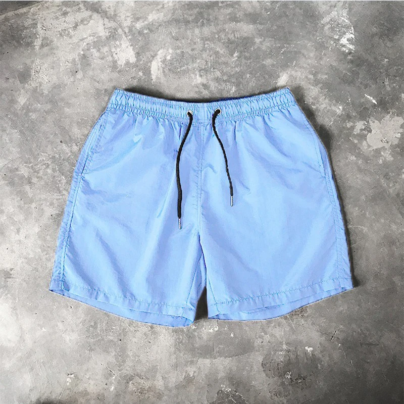Pantaloncini da surf all'ingrosso Pantaloncini casual da spiaggia da uomo personalizzati Capispalla di moda Costume da surf allentato impermeabile484_voghion.com