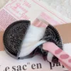 Pincement d'oreo de ruse qiao noir