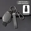 Portachiavi pistola grigio + pelle