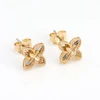 Flower-shaped earrings (with 1