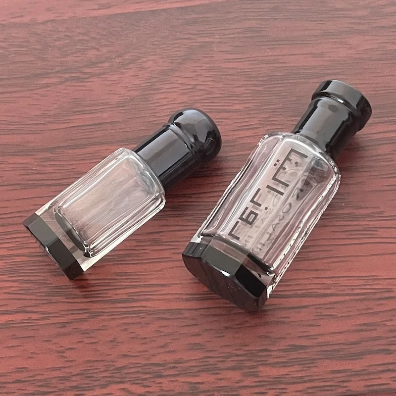 Boming Wholesale 3ml 6ml 12m Fancy Arab Attar Bottle Black Roller Bottle Glass Stick Bottle with Crystal Base