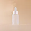 frosted bottle + plastic white ring + white rubber head