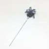 Remolque de plumas con pompones (gris)