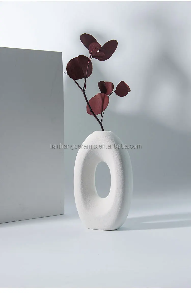 Custom Promotional Logo Nordic Modern White Ceramic Vase for Home Decor Desktop Interior Decorative Table Hollow Out Flower Vase.jpg