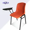 Orange armchair writing board