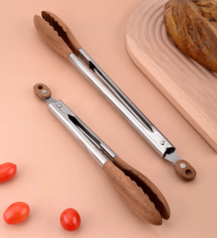 Hot Sale Stainless Steel Walnut Olive Wooden Kitchen BBQ Spaghetti Meat Garlic Clip Fry Food Tongs With Wood Lock manufacture