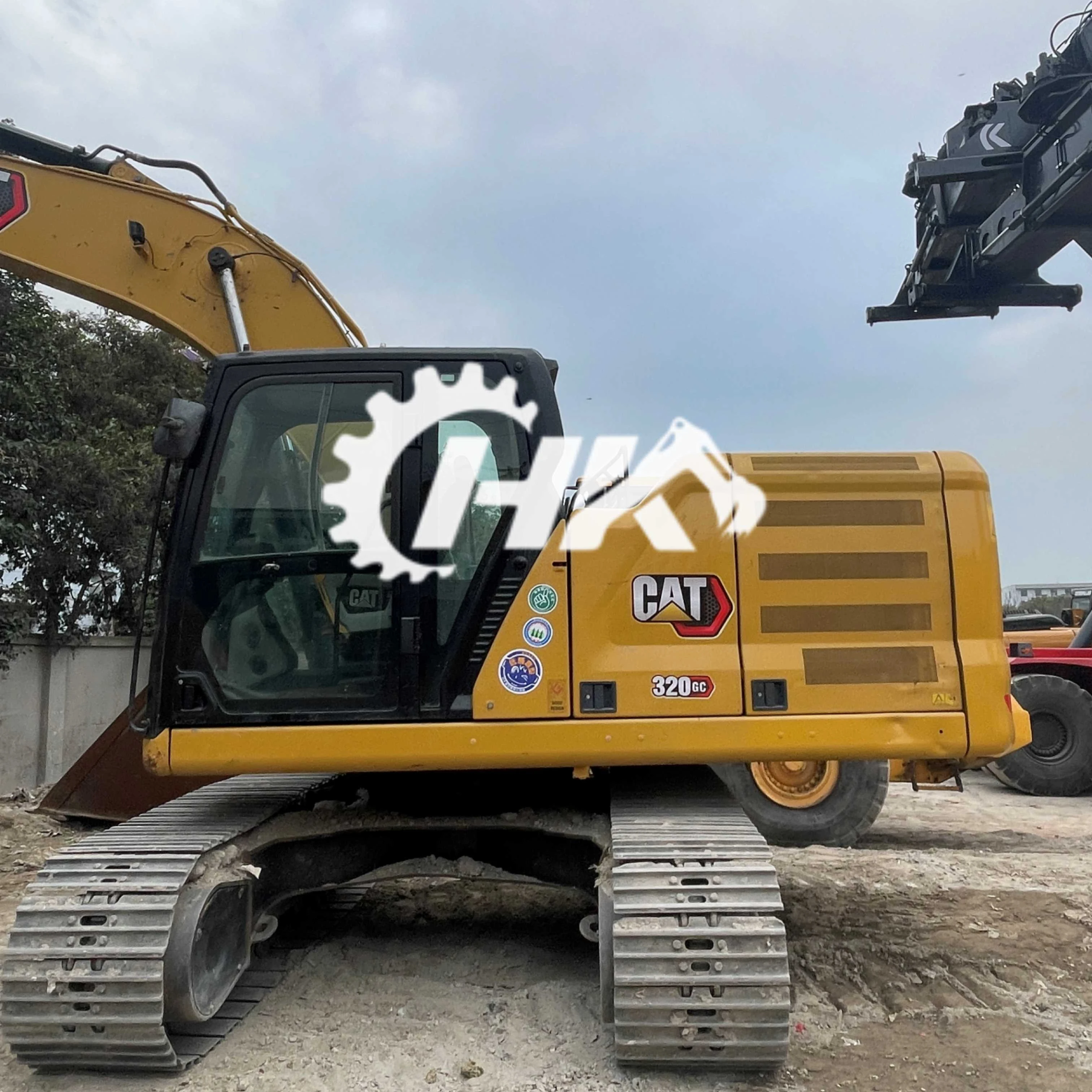 హైడ్రాయలిక్ ఎక్స్కావేటర్ 320 తో రంగాన్ని మరియు దక్షత