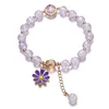 Bracciale con margherite e perline color popcorn viola chiaro