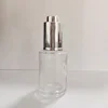 Clear with silver dropper