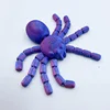 Araña roja y azul de 11,5 cm con atracción magnética.