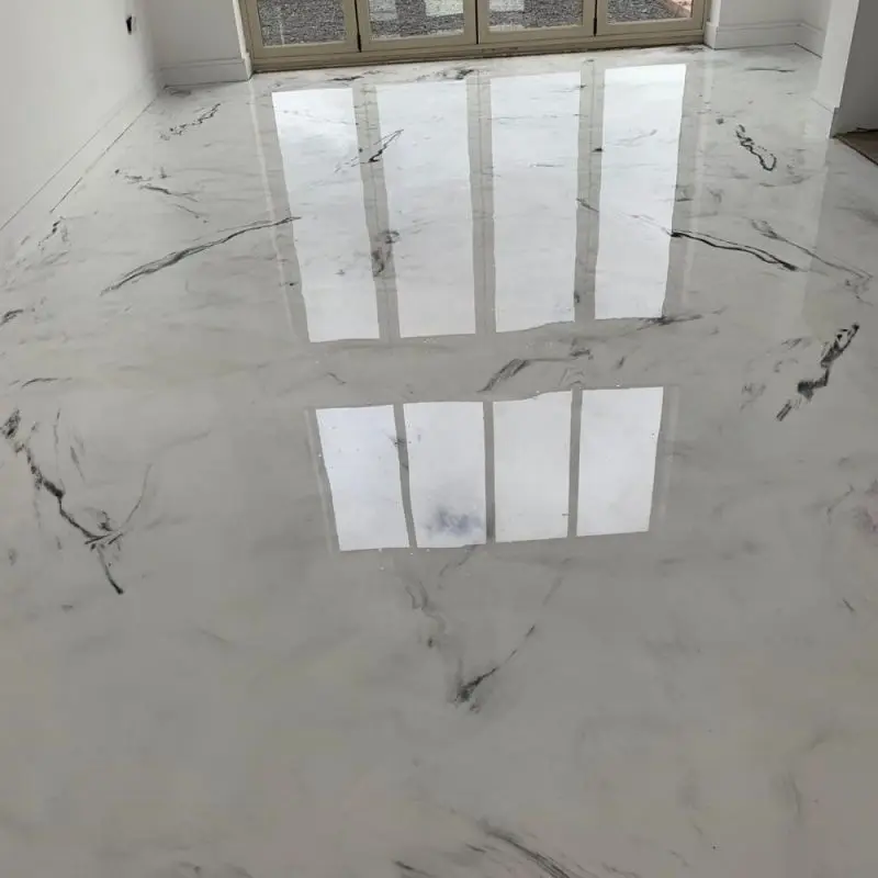 White Marble Metallic Epoxy Floor from Glossy Floors