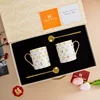 gold-rimmed star pattern cup + spoon, rice color gift box