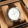 brown strap-white dial