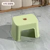 Large square stool in refreshing green.