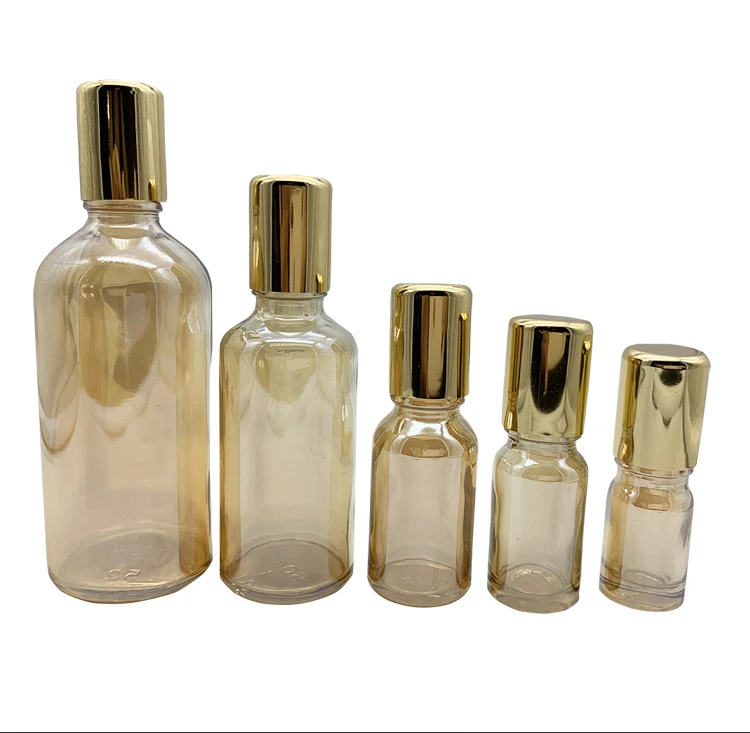 Luxury Golden Glass Roll On Bottles 50ml 100ml Glass Vials With Roller Ball